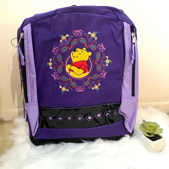Disney Other - New Winnie the Pooh purple backpack